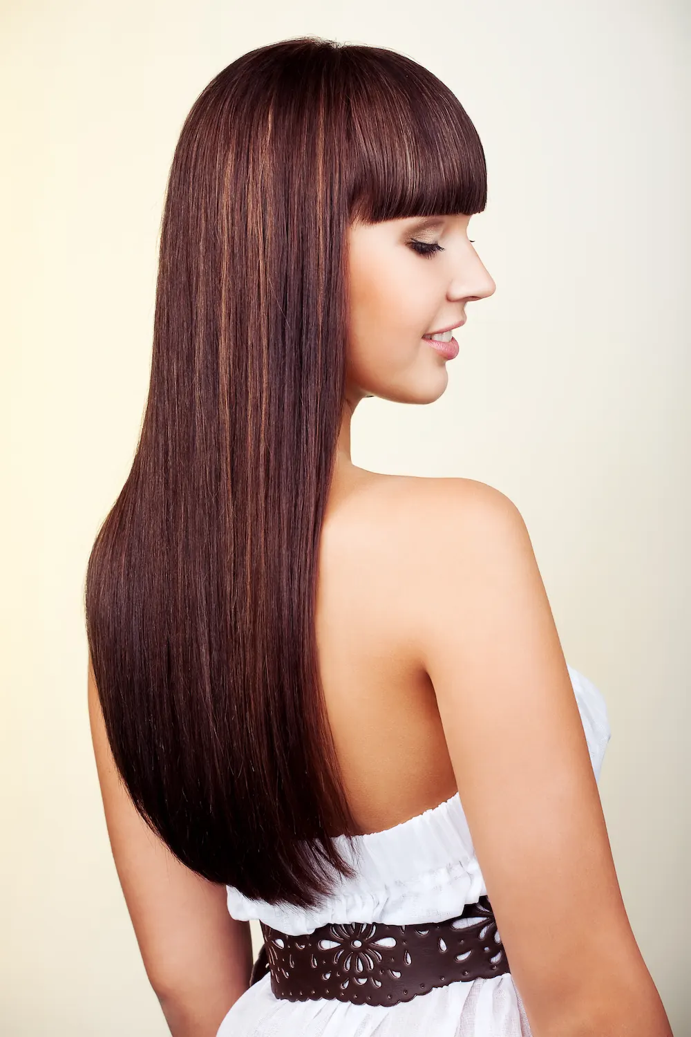 Long straight hair with blunt bangs